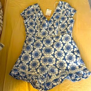 Blue and white eyelet romper (L but fits like a 6)